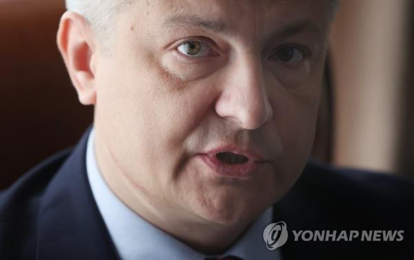 Ukrainian Ambassador to South Korea Dmytro Po<em></em>nomarenko speaks during an interview with Yo<em></em>nhap News Agency at the Ukrainian Embassy in Seoul on Feb. 21, 2023, as the Russian invasion of Kyiv marks its first anniversary on Feb. 24. (Yonhap)