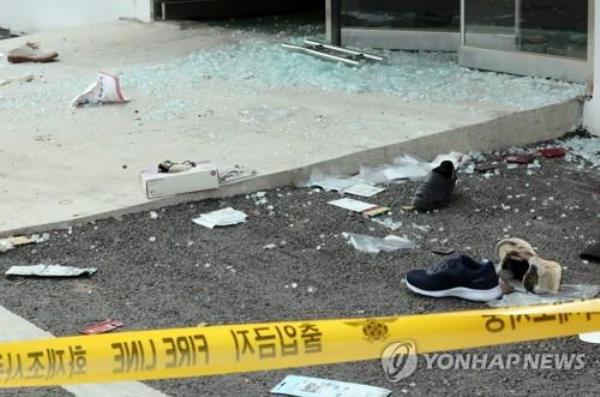 Pieces of broken glass are left strewn at the site of a truck crush in the southern county of Sunchang on March 8, 2023. (Yonhap) 