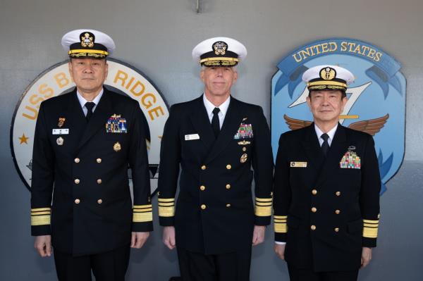 ROK (Republic of Korea) Fleet Commander Vice Adm. Kim Myung-soo (L), U.S. Seventh Fleet Commander Vice Adm. Karl Thomas (C) and Japan's Self-Defense Fleet Commander Vice Adm. Akira Saito pose for a photo as they meet aboard the USS Blue Ridge at the U.S. Seventh Fleet in Yokosuka, Japan, on Feb. 22, 2023, in this photo released by the South's Navy. (PHOTO NOT FOR SALE) (Yonhap)