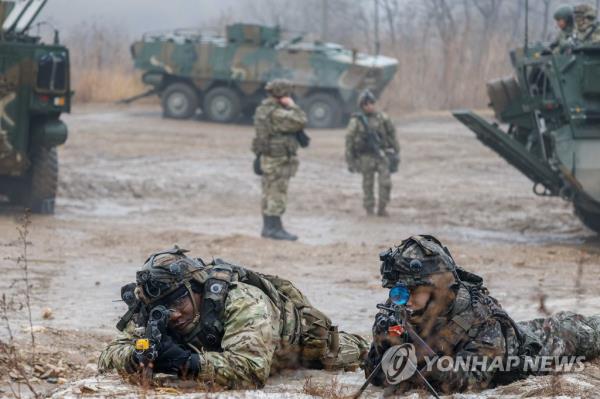 This file photo, taken Jan. 13, 2023, show South Korean and U.S. soldiers engaging in combined drills at a training site in Paju, 28 kilometers northwest of Seoul. (Pool photo) (Yonhap) 