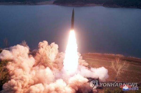 This photo, carried by North Korea's official Korean Central News Agency (KCNA) on March 15, 2023, shows the North firing two ground-to-ground ballistic missiles from Jangyon, South Hwanghae Province, the previous day. (For Use o<em></em>nly in the Republic of Korea. No Redistribution) (Yonhap)