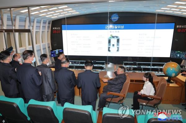 North Korean leader Kim Jong-un (2nd from R) and his daughter, known as Ju-ae, visit the North's space development agency on April 18, 2023, in this photo released by the North's official Korean Central News Agency the next day. (For Use o<em></em>nly in the Republic of Korea. No Redistribution) (Yonhap)