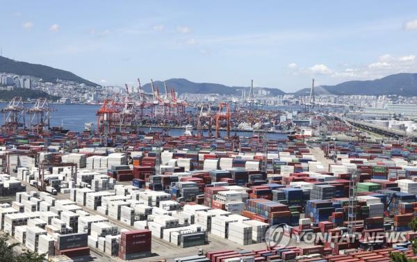 Shipping co<em></em>ntainers are stacked at a port in Busan, 320 kilometers south of Seoul, in this Aug. 1, 2023, file photo. (Yonhap)