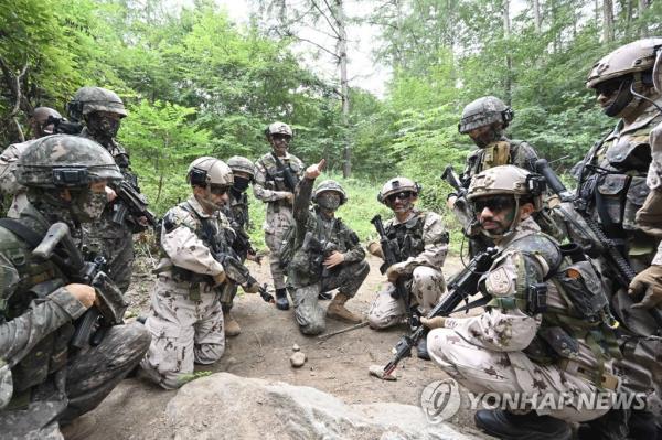 South Korean and United Arab Emirates troops take part in a combined high-tech military exercise at the Korea Combat Training Center in Inje County, 165 kilometers east of Seou, in this photo provided by the South's Army on Aug. 16, 2023. (PHOTO NOT FOR SALE) (Yonhap)