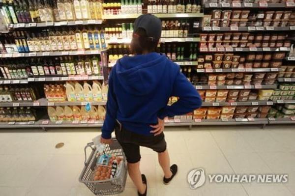 In this file photo, a shopper browses products at a supermarket in Seoul on May 2, 2023. (Yonhap)