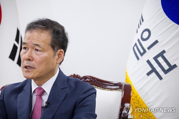 This file photo, taken Oct. 18, 2023, shows Unification Minister Kim Yung-ho speaking in an interview with Yo<em></em>nhap News Agency and Yo<em></em>nhap News TV. (Yonhap)